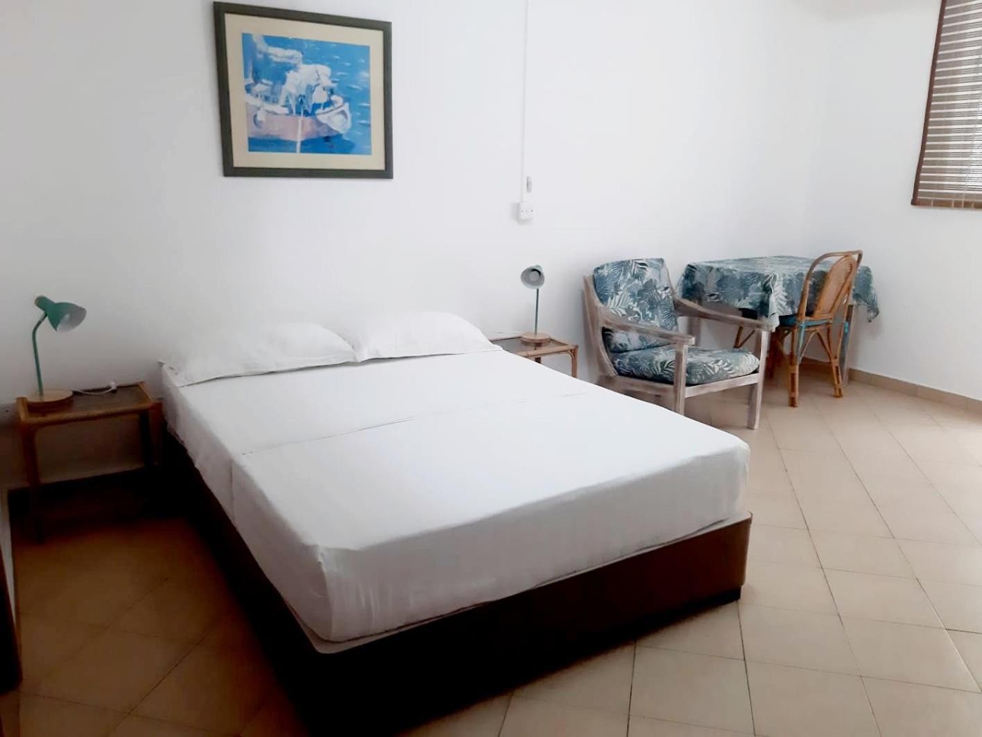 La Perla Holiday Apartments Pereybere Beach Room photo